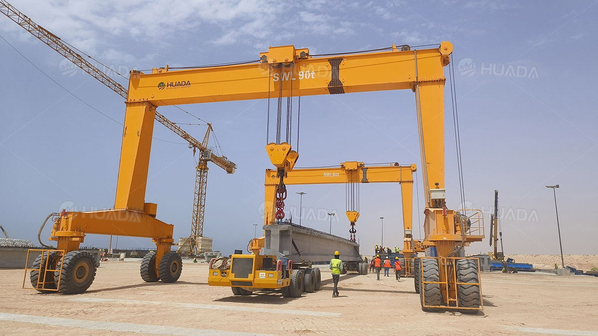 straddle-carrier-operator-performs-material-handling-huada